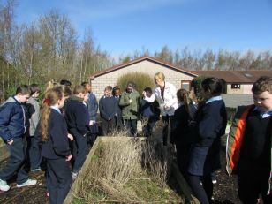 Mrs. Kiely's 4th class get busy testing the soil in the school garden